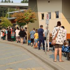 Families lined up outside the school